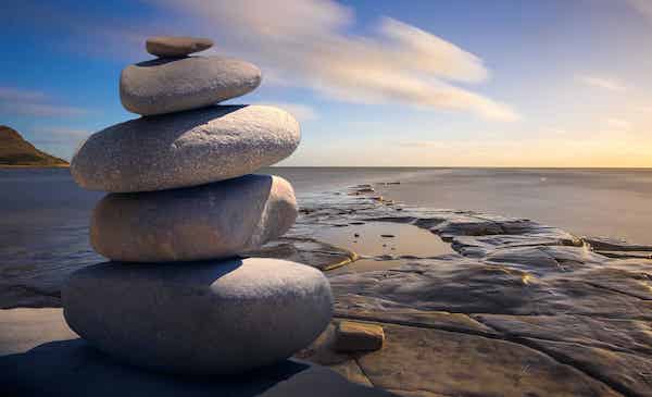Rocks stacked water background 45 inner peace quotes