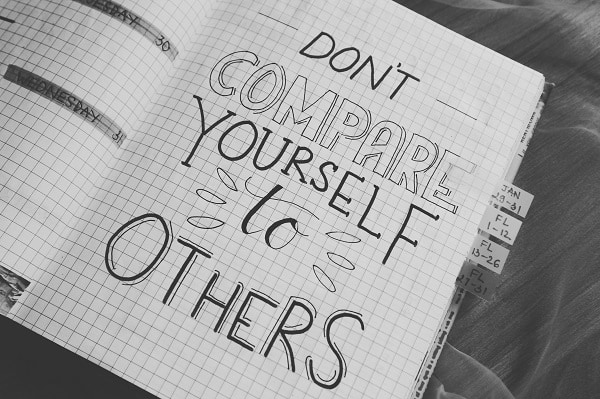 Paper with words don't compare yourself to others. How to stop comparing yourself to others