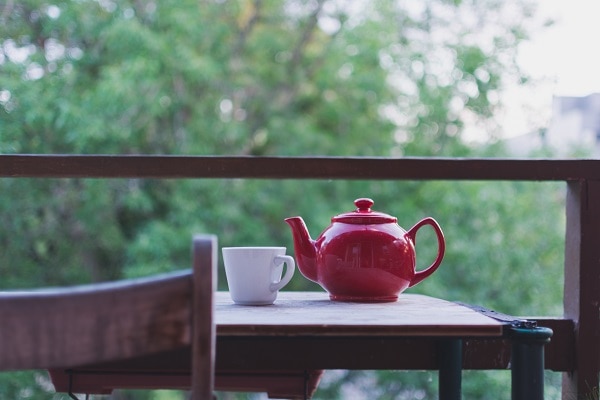 red tea pot tea cup nature background 20 ways to make yourself feel better