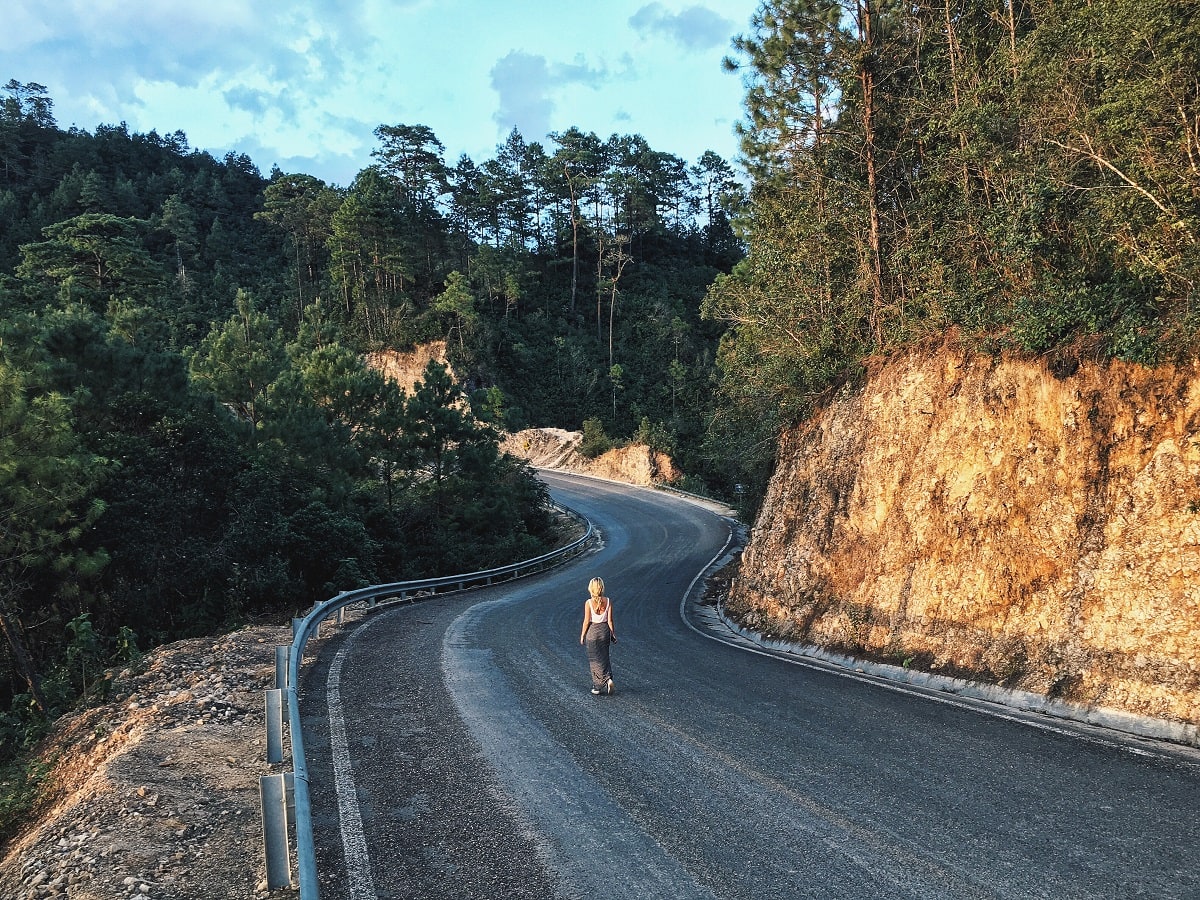 Person walking down a road