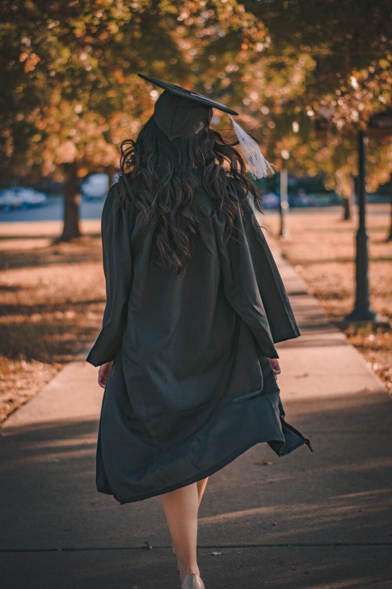 Woman in graduation outfit